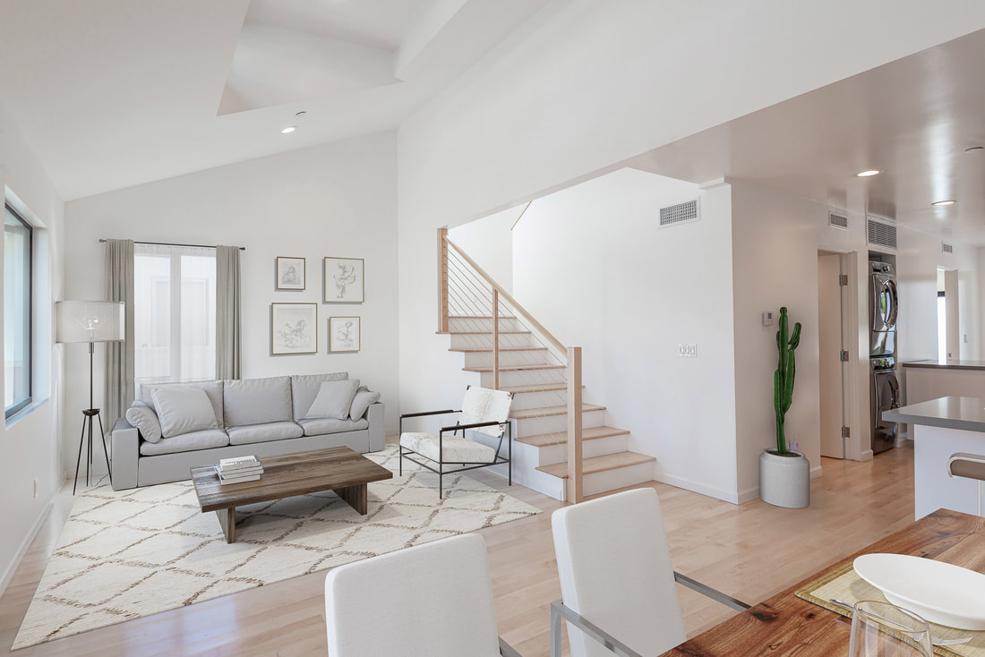 Virtual Staging where an empty living room digitally staged with modern furniture and decor