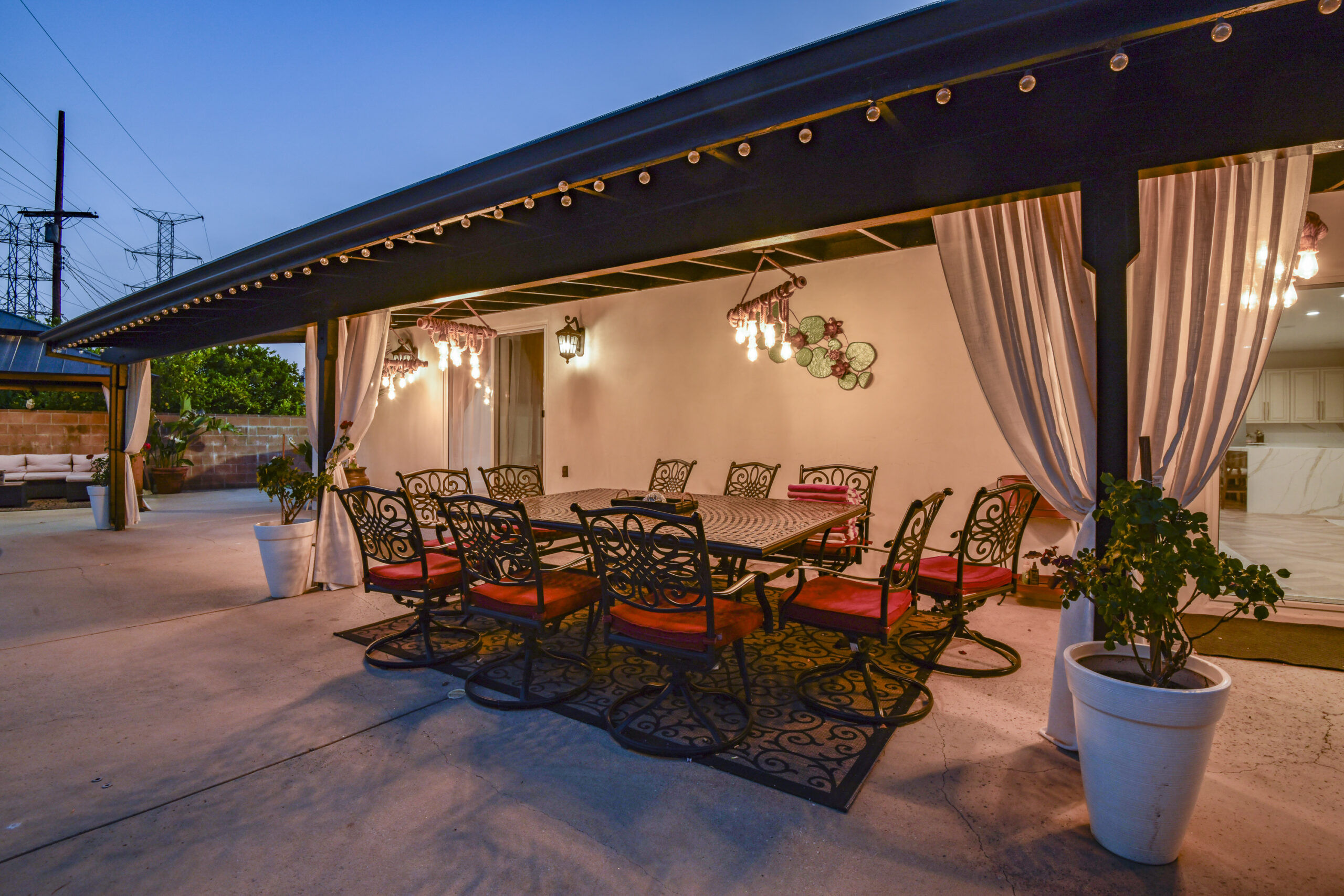 twhilight photography for luxury listings Backyard sitting aerial in a coze summer night by Klkiarts Photography Los Angeles